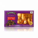 A purple box of IMPRA Blackcurrant Pure Ceylon Tea, featuring a graphic of blackcurrants, a vintage painting, and a gold seal, set against a white background with a soft reflection.