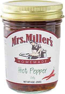Mrs. Miller's Hot Pepper Jelly 9 oz in a clear glass jar with gold lid, featuring a vintage-style label and red chili pepper illustration.