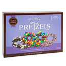 Nancy Adams Premier Pretzel 10.3 oz gift box featuring chocolate-covered pretzels with colorful candy and sprinkles, ideal for gourmet snacking.